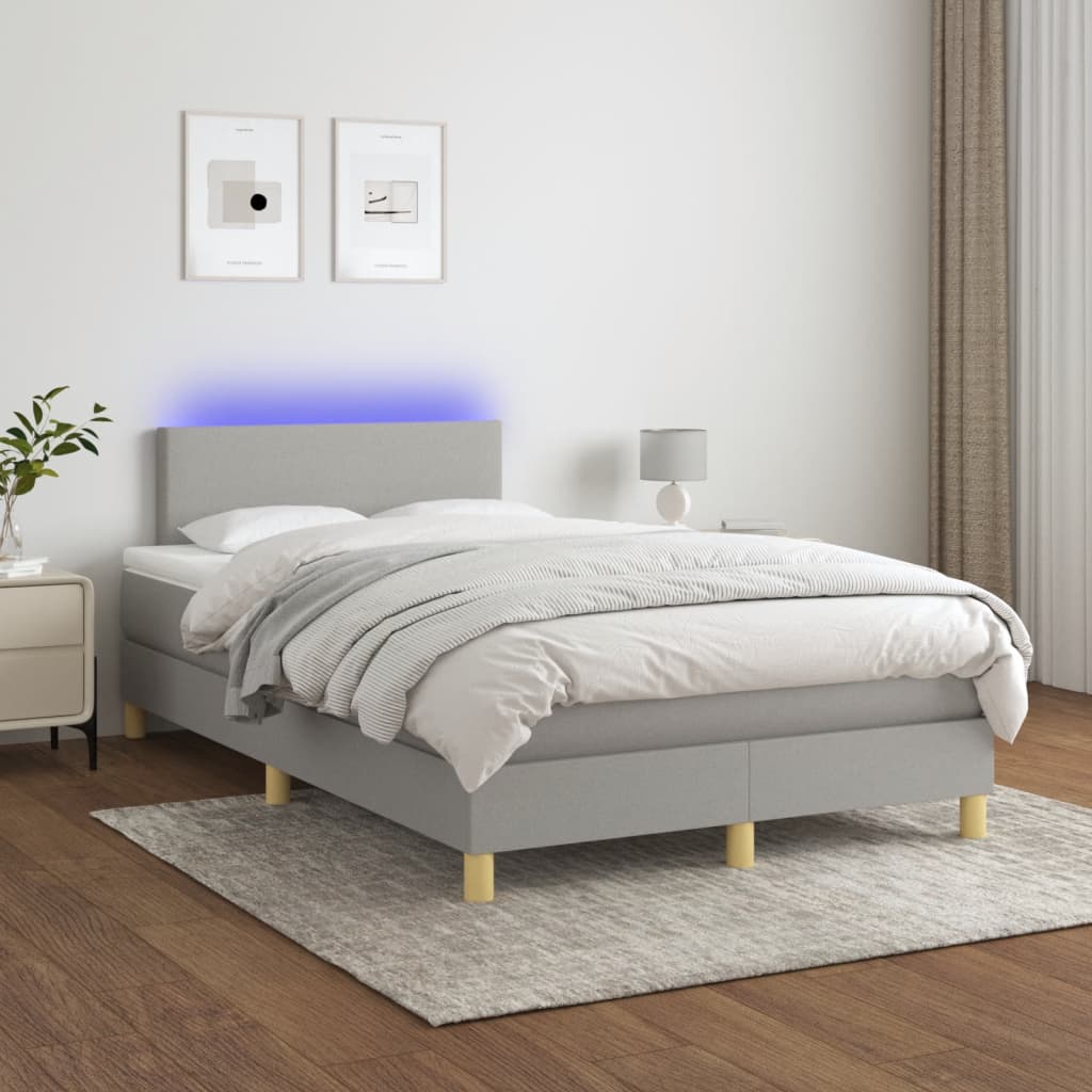 vidaXL Posteľ boxsping s matracom a LED bledosivá 120x200 cm látka