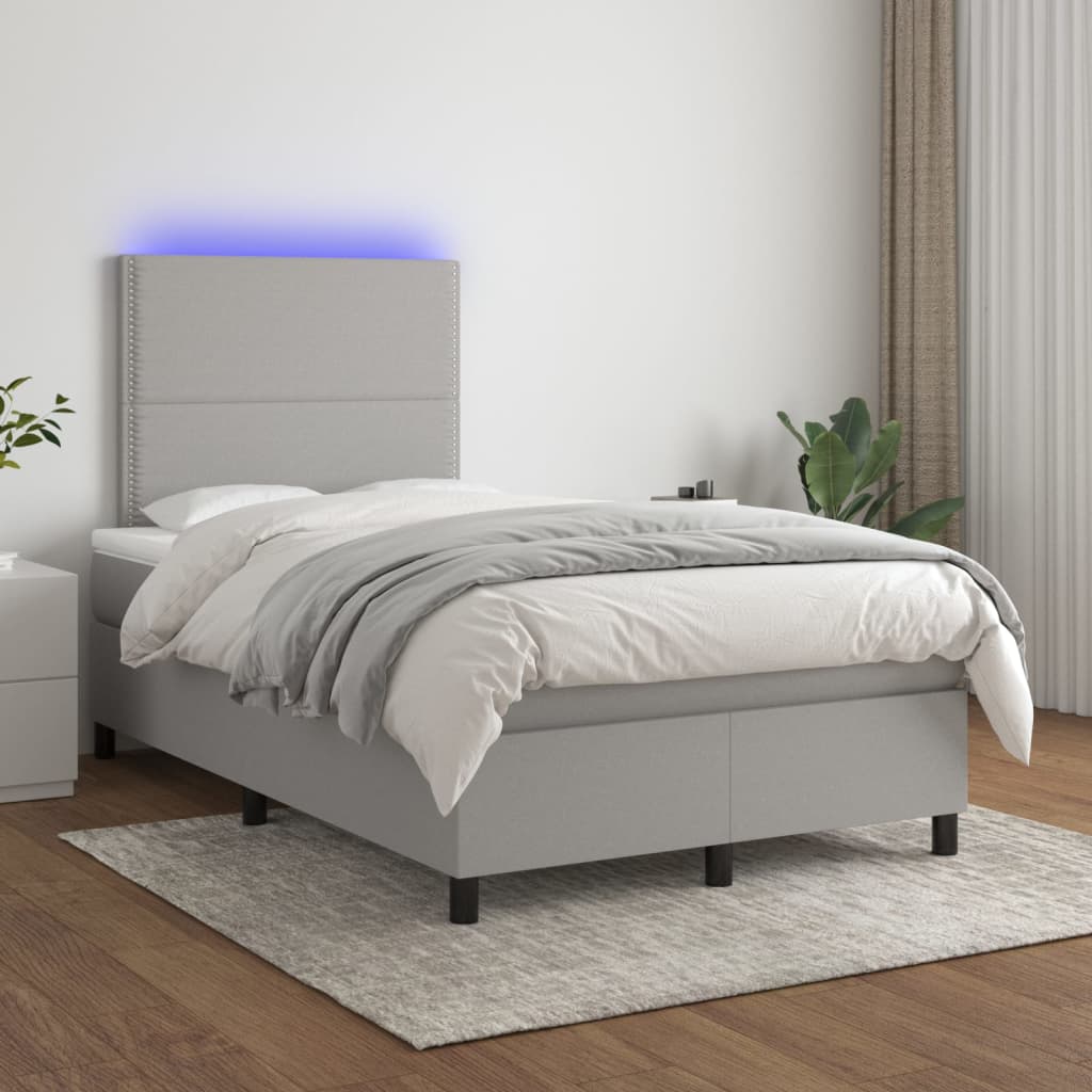 vidaXL Posteľ boxsping s matracom a LED bledosivá 120x200 cm látka