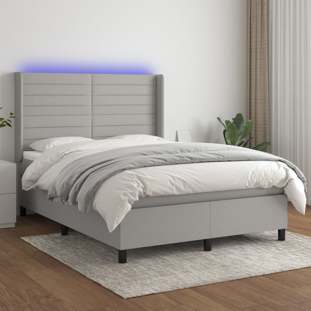 vidaXL Posteľ boxsping s matracom a LED bledosivá 140x200 cm látka