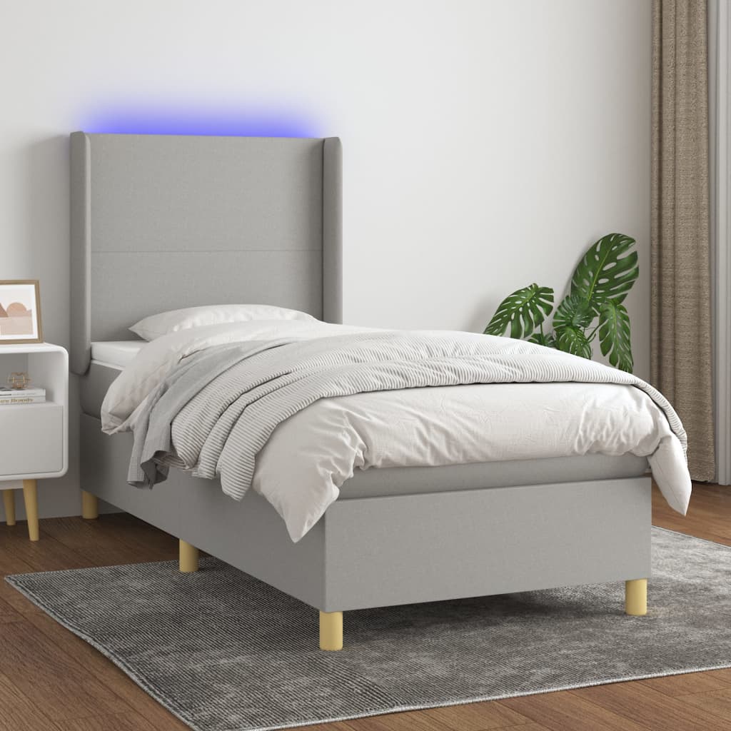 vidaXL Posteľ boxsping s matracom a LED bledosivá 80x200 cm látka