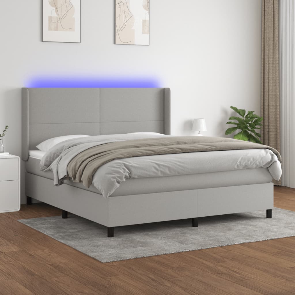 vidaXL Posteľ boxsping s matracom a LED bledosivá 160x200 cm látka