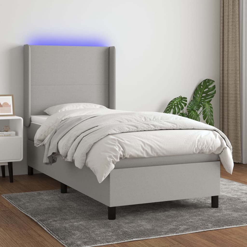 vidaXL Posteľ boxsping s matracom a LED bledosivá 80x200 cm látka
