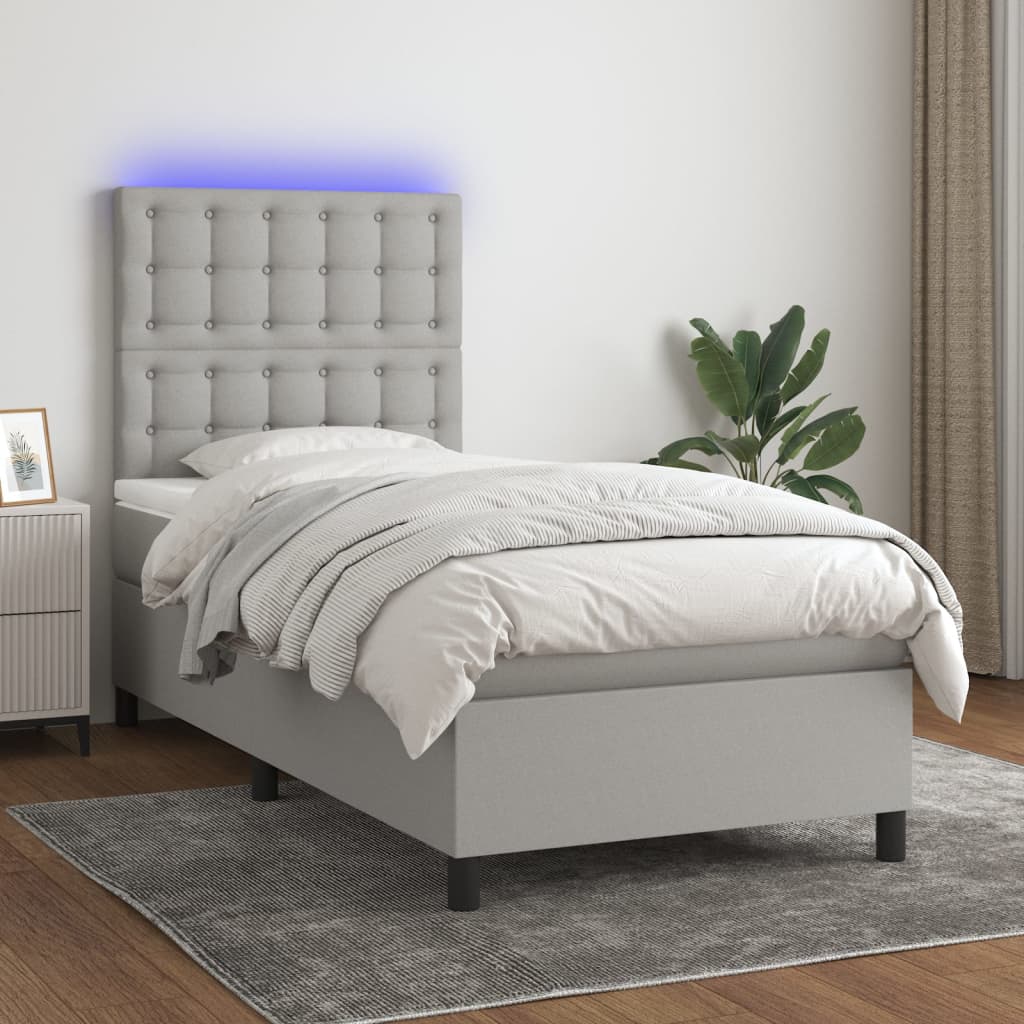 vidaXL Posteľ boxsping s matracom a LED bledosivá 90x200 cm látka