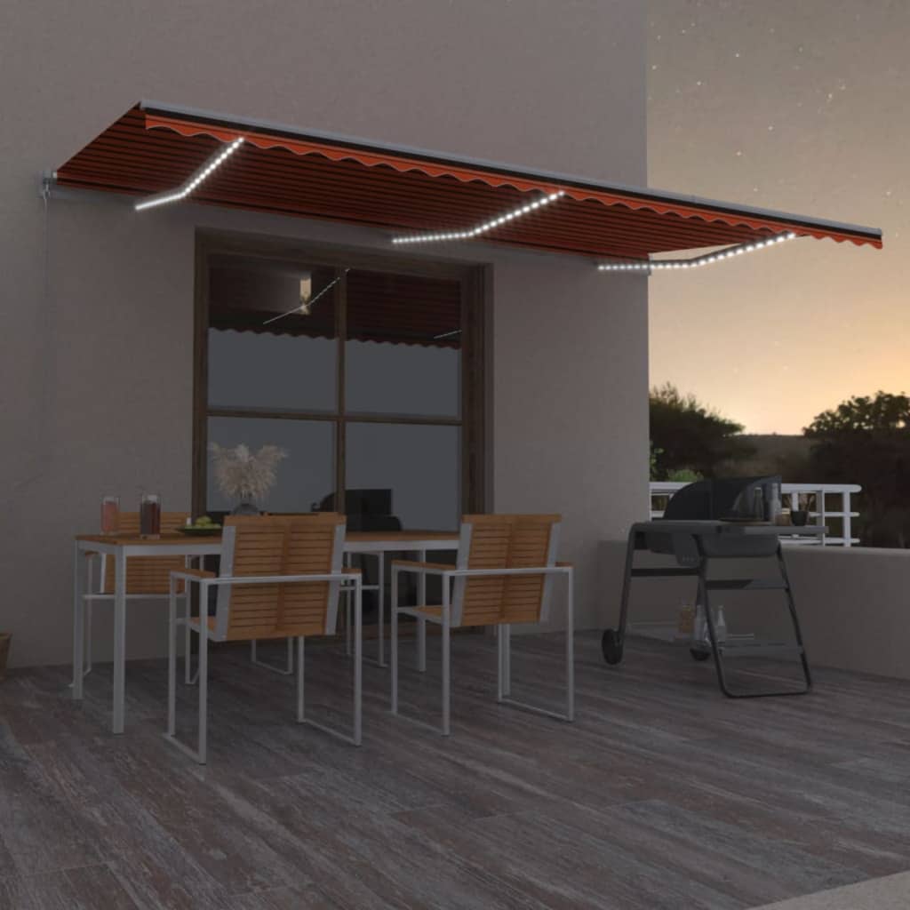 vidaXL Ručne zaťahovacia markíza s LED 600x300 cm oranžovo-hnedá