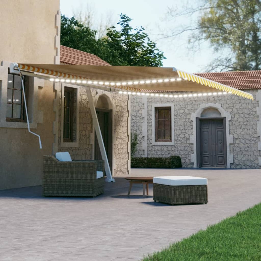 vidaXL Ručne zaťahovacia markíza s LED 500x300 cm žltá a biela