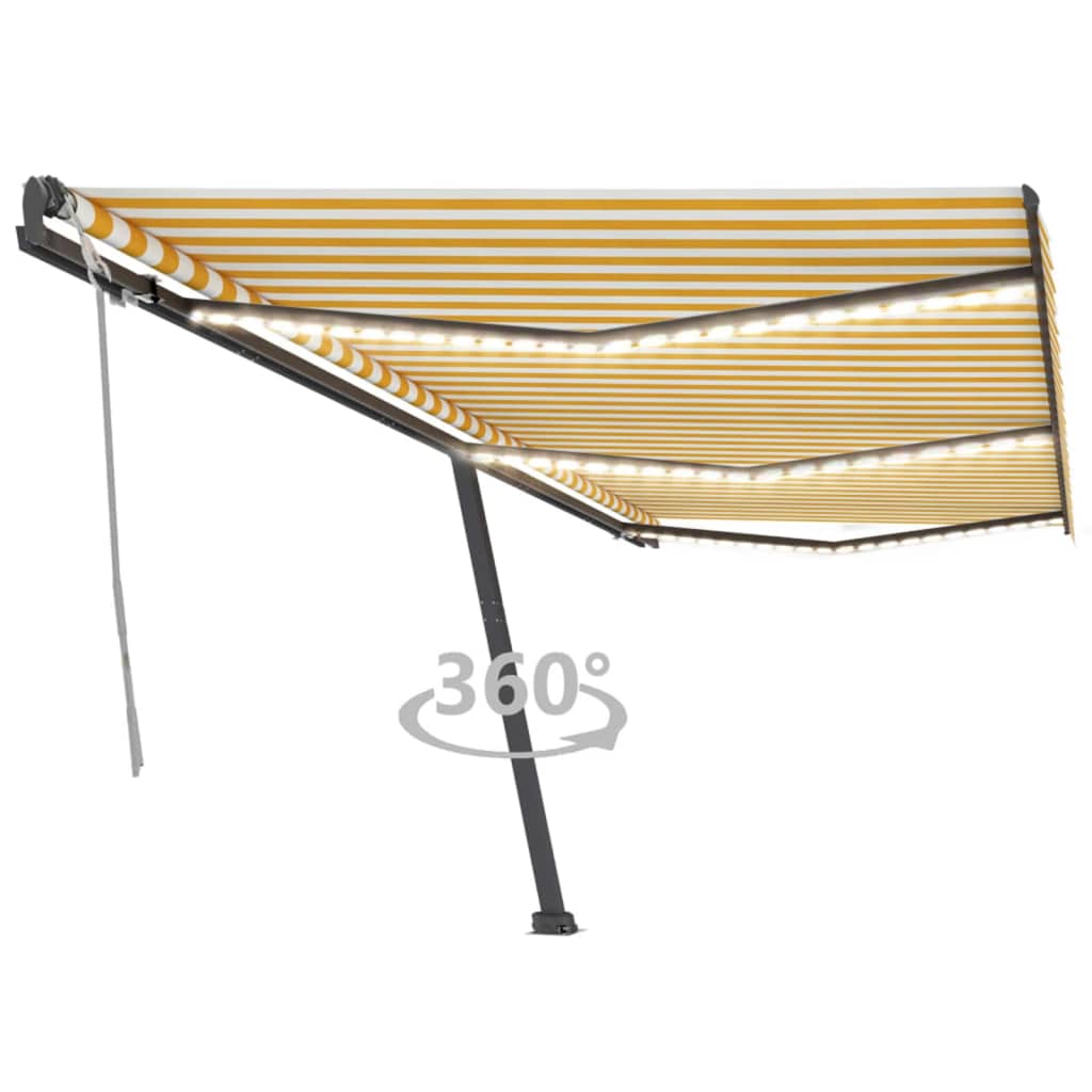 vidaXL Ručne zaťahovacia markíza s LED 600x300 cm žltá a biela