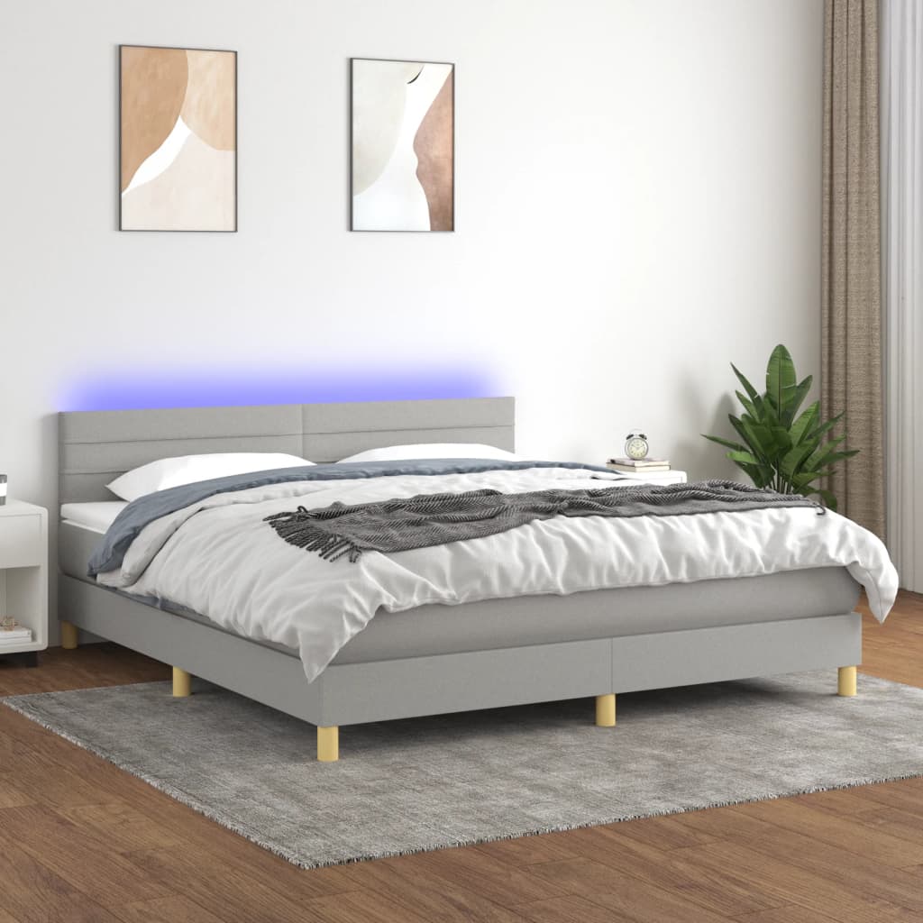 vidaXL Posteľ boxsping s matracom a LED bledosivá 180x200 cm látka