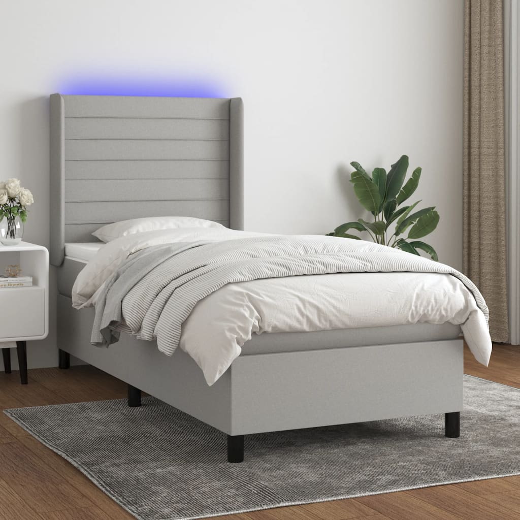 vidaXL Posteľ boxsping s matracom a LED bledosivá 90x190 cm látka