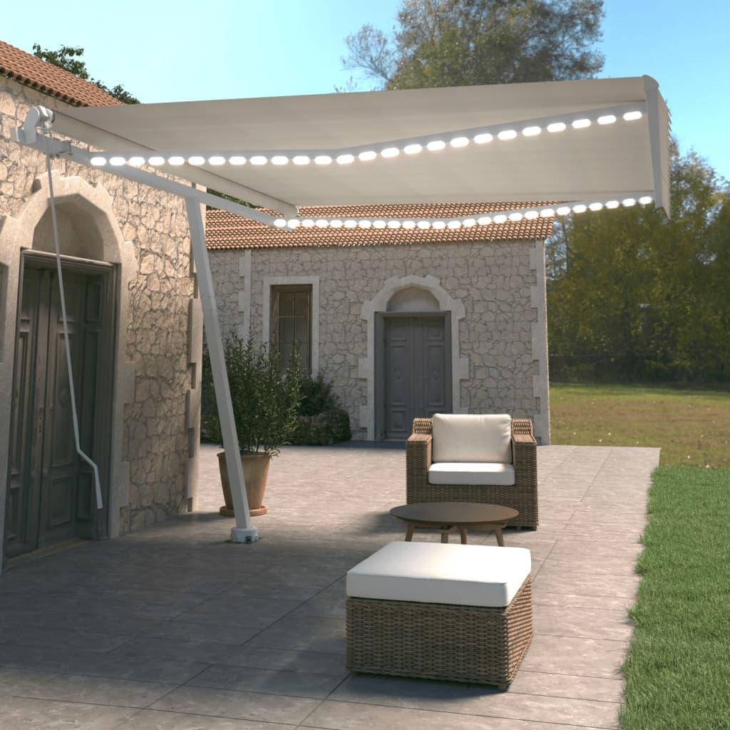vidaXL Ručne zaťahovacia markíza s LED 400x350 cm krémová