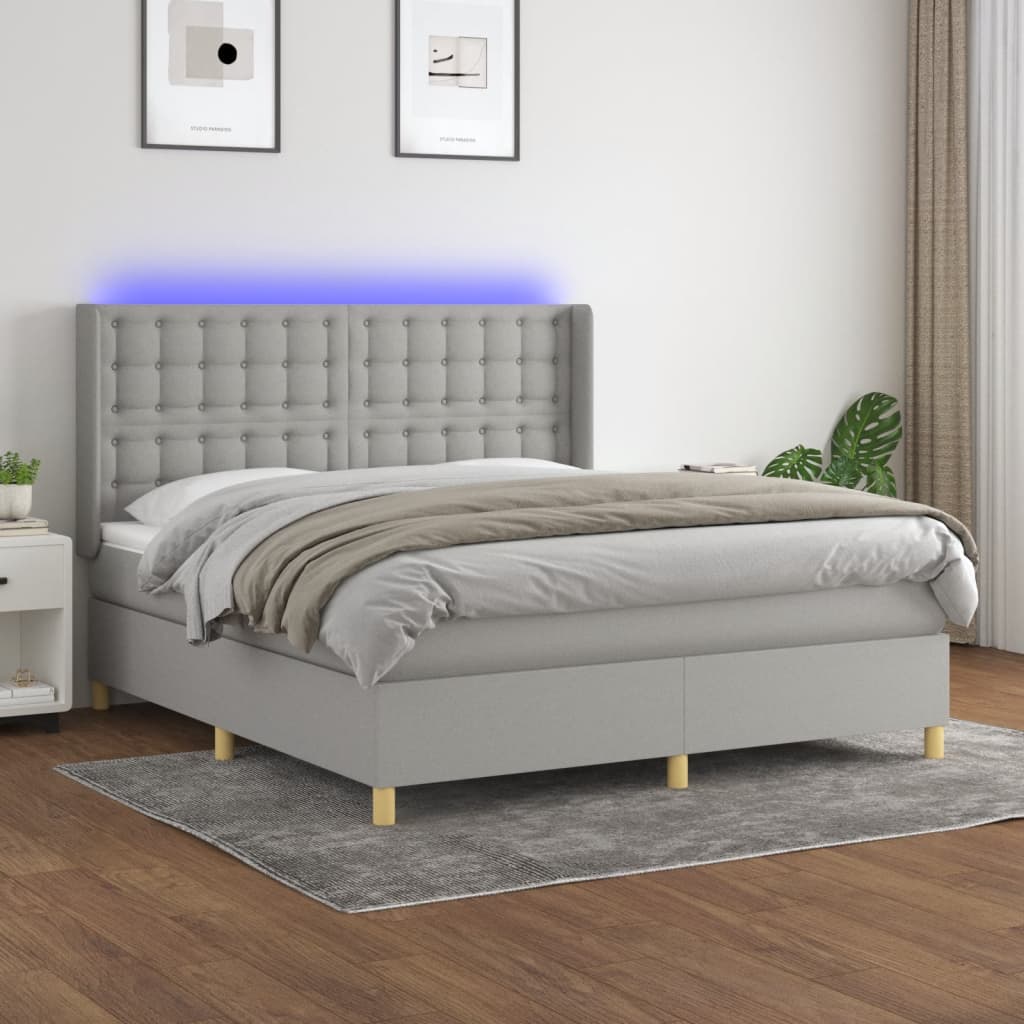 vidaXL Posteľ boxsping s matracom a LED bledosivá 160x200 cm látka