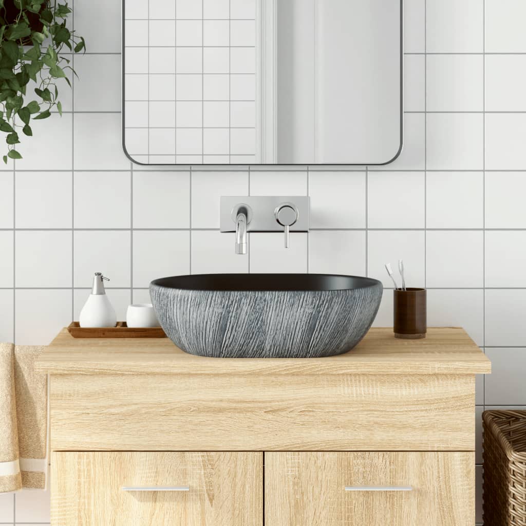 vidaXL Umývadlo na dosku čierno-sivé oválne 47x33x13 cm keramické