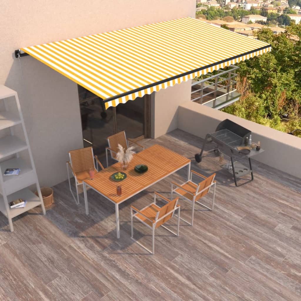vidaXL Ručne zaťahovacia markíza 600x350 cm žltá a biela