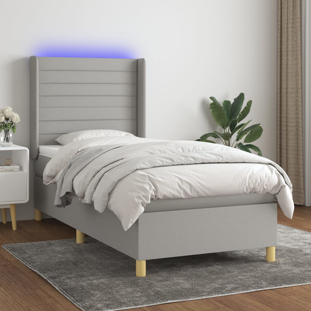 vidaXL Posteľ boxsping s matracom a LED bledosivá 80x200 cm látka