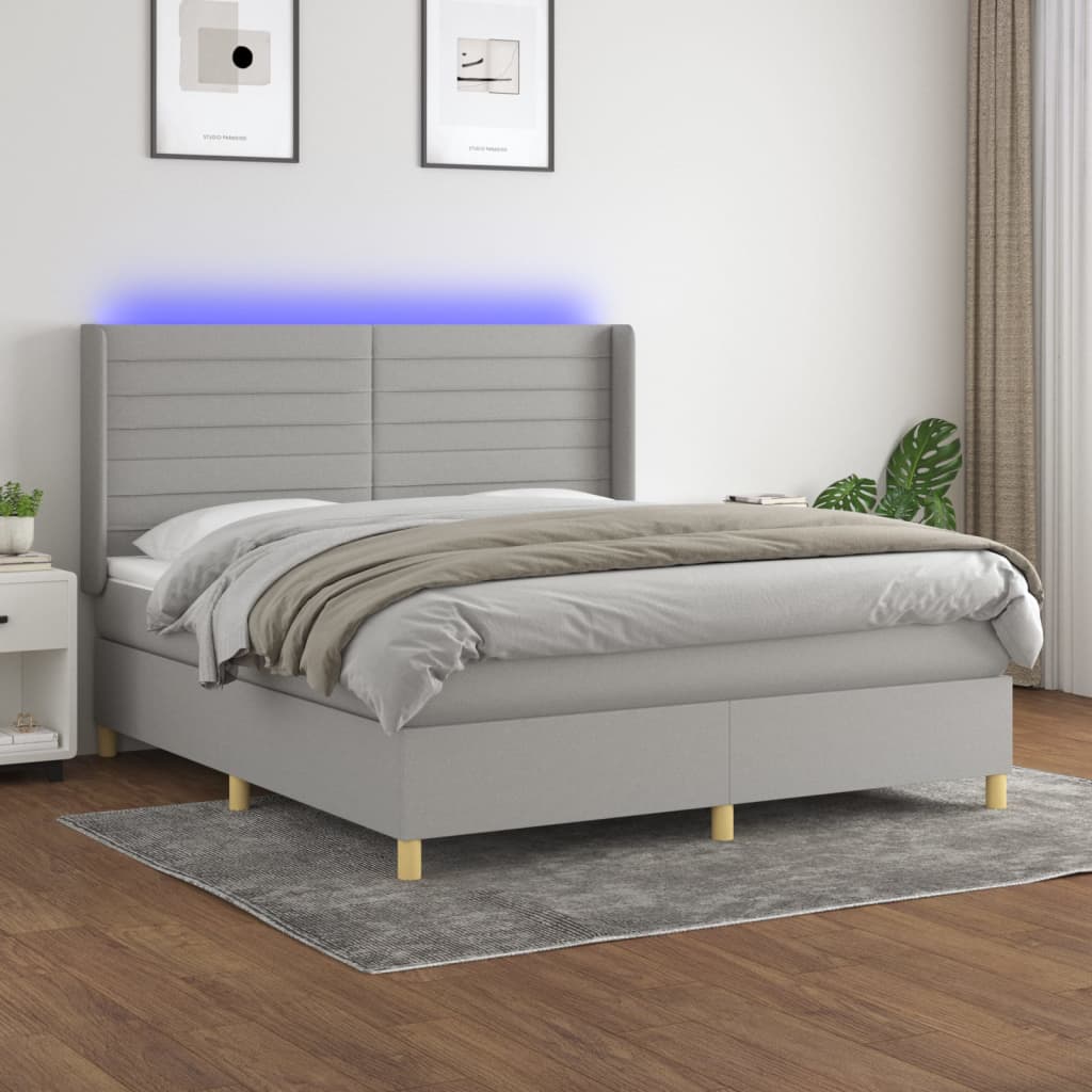 vidaXL Posteľ boxsping s matracom a LED bledosivá 160x200 cm látka