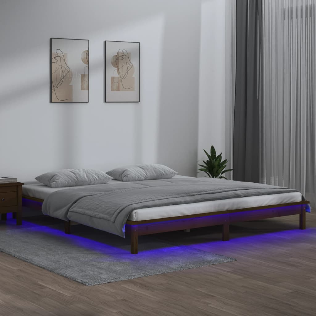 vidaXL Posteľný rám s LED medový 140x190 cm masívne drevo