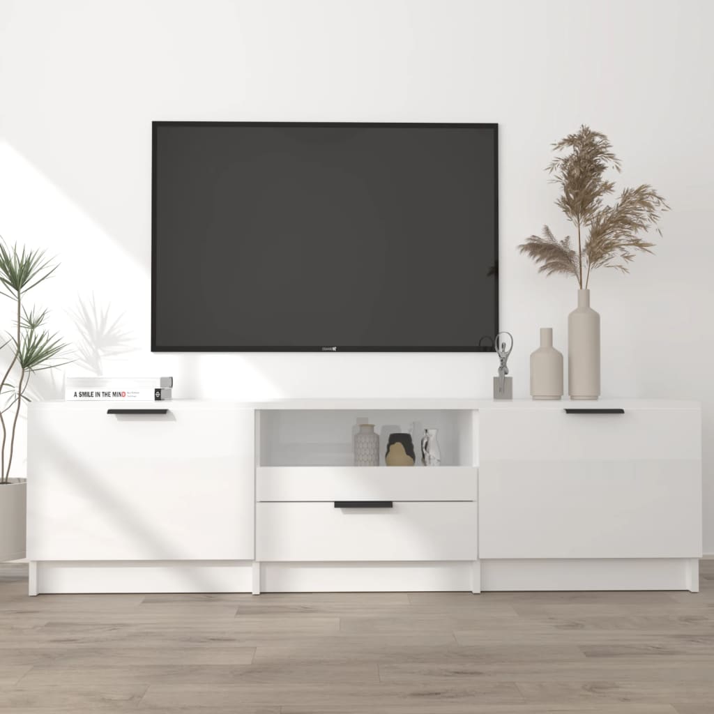 vidaXL TV stolík lesklý biely 140x35x40 cm spracované drevo