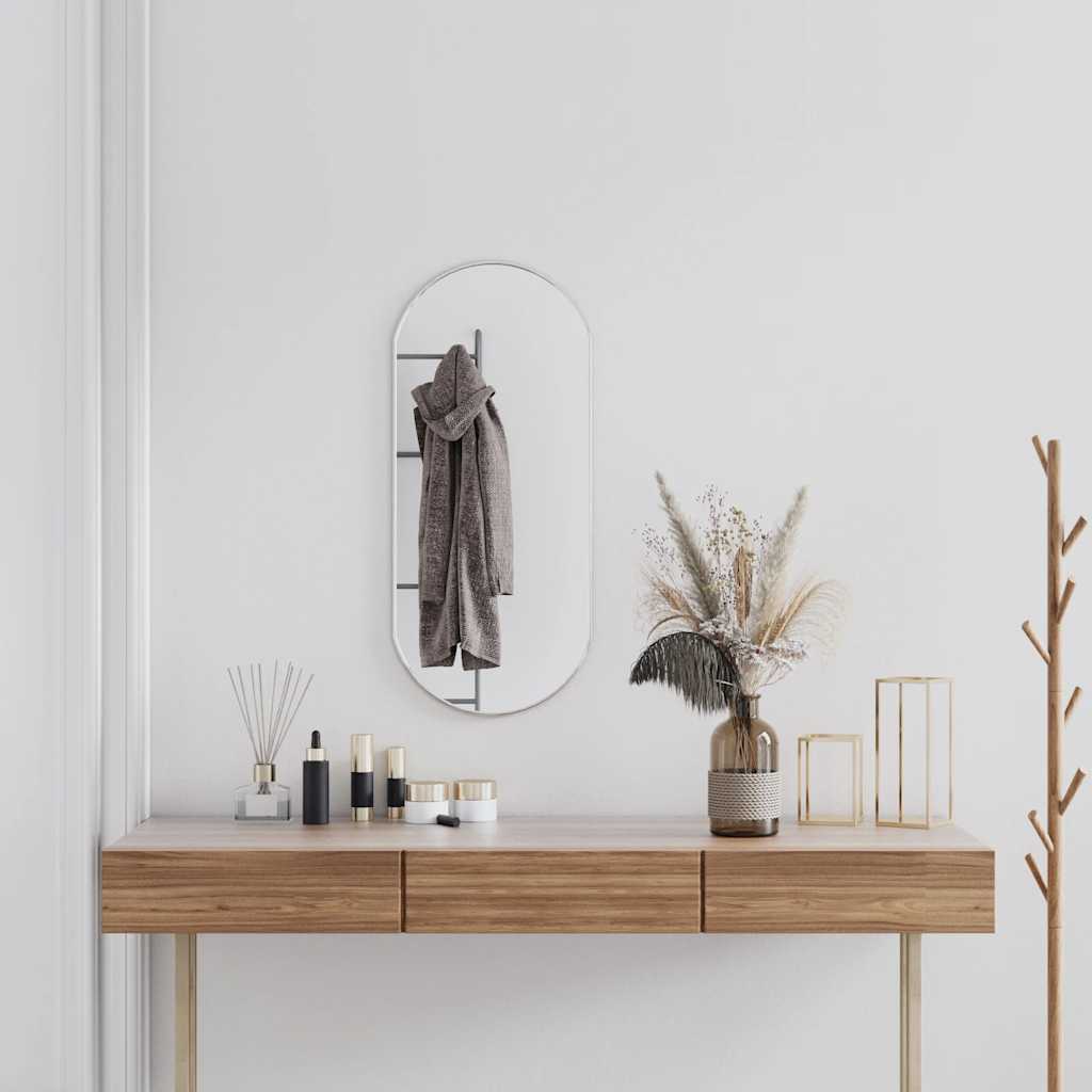 E-shop vidaXL Nástenné zrkadlo strieborné 80x35 cm okrúhle