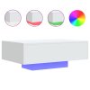 vidaXL Konferenčný stolík s LED svetlami biely 85x55x31 cm