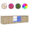 vidaXL TV skrinka s LED svetlami dymový dub 140x40x36 cm