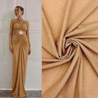 🌟 Lesk, který zaujme! 🌟 Elastický úplet s lurexem v zlaté barvě – látku, která vnese do tvých kreací pravý glamour efekt!...