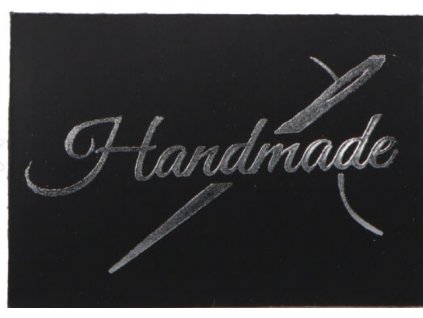 Štítek se stříbrným písmem Handmade s jehlou