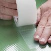 Opravná lepící páska na polykarbonát a sklo, 25 m × 50 mm, průhledná
