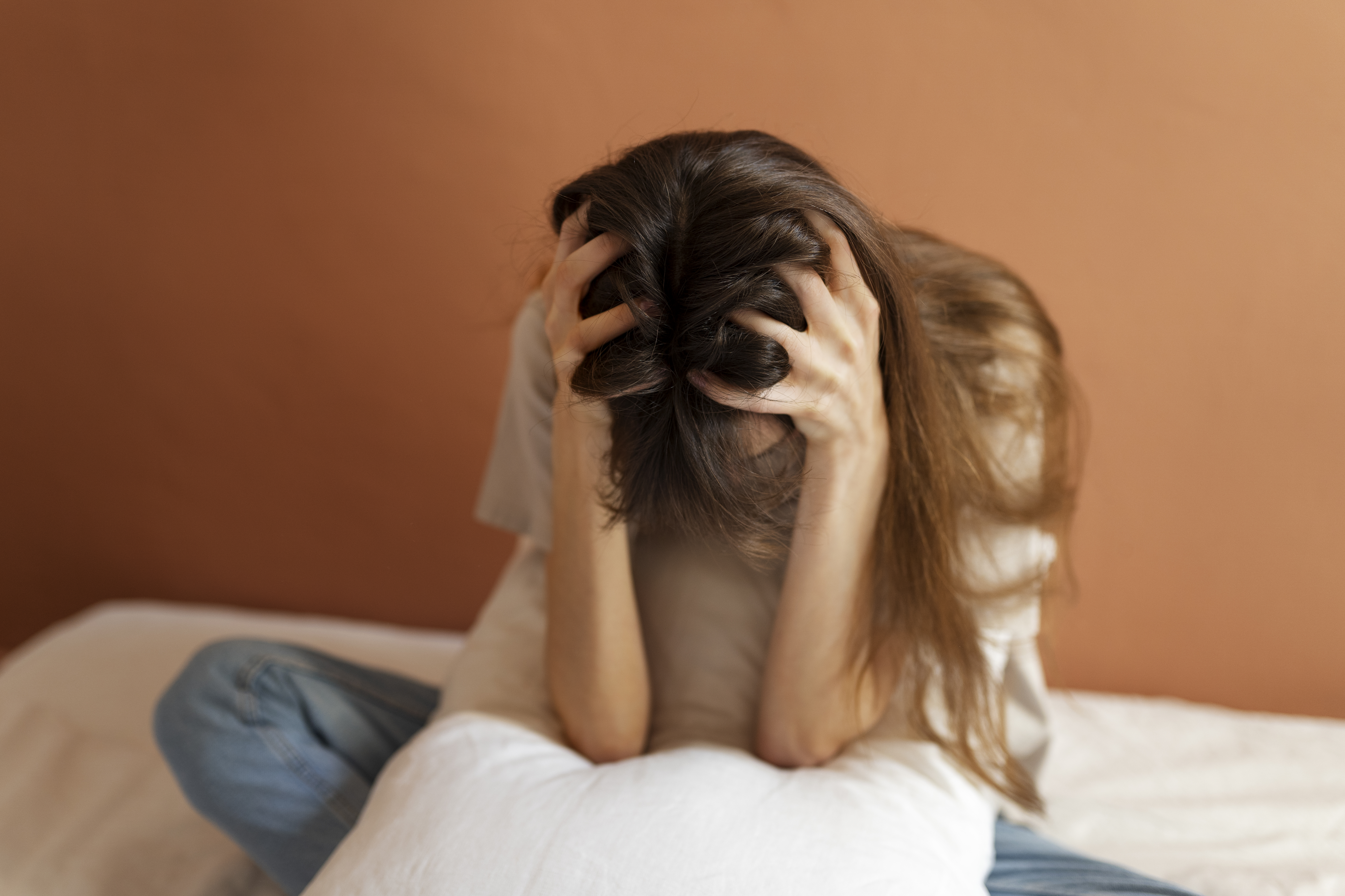 insecure-woman-home-high-angle