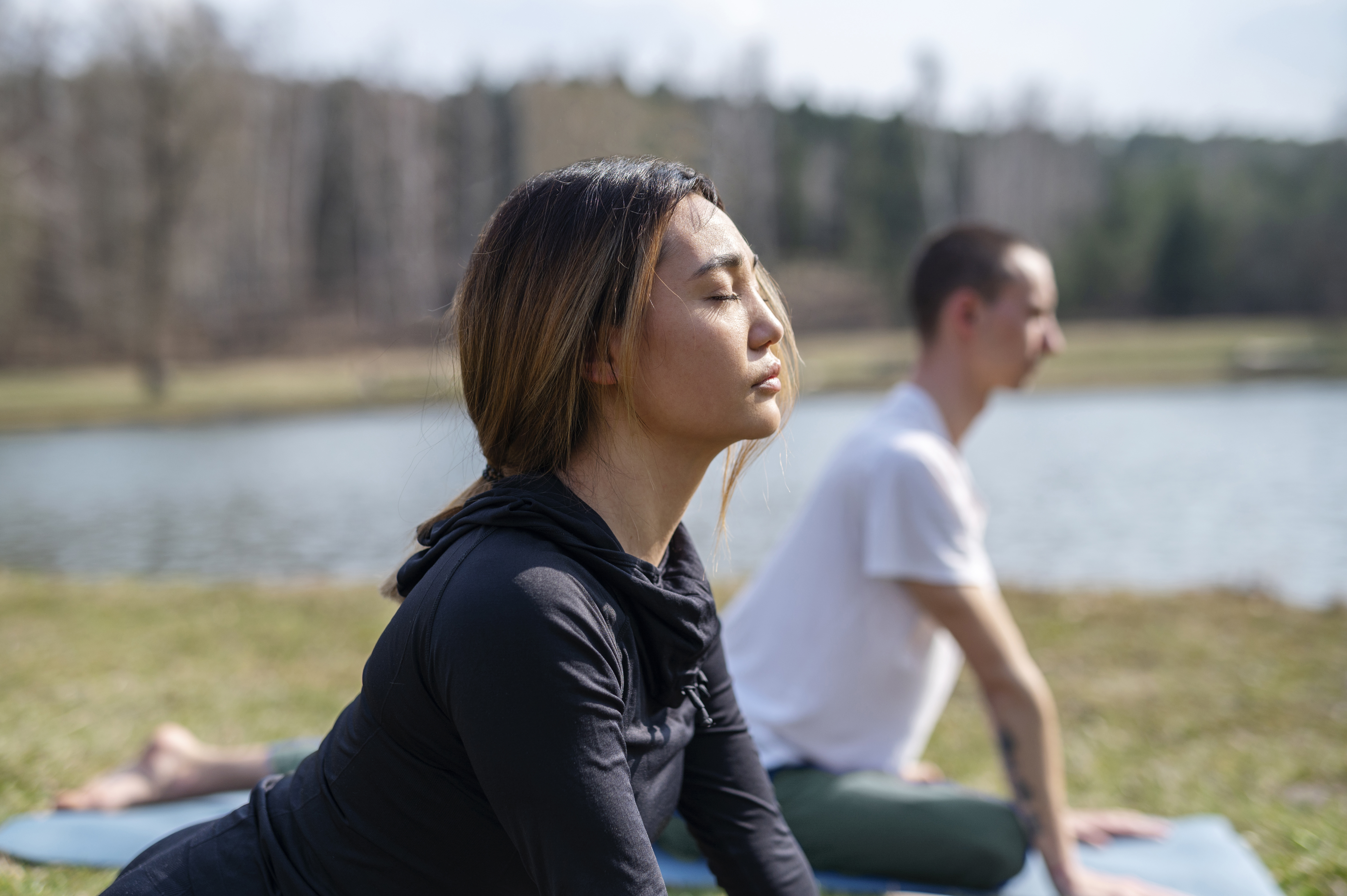 people-practicing-yoga-outside