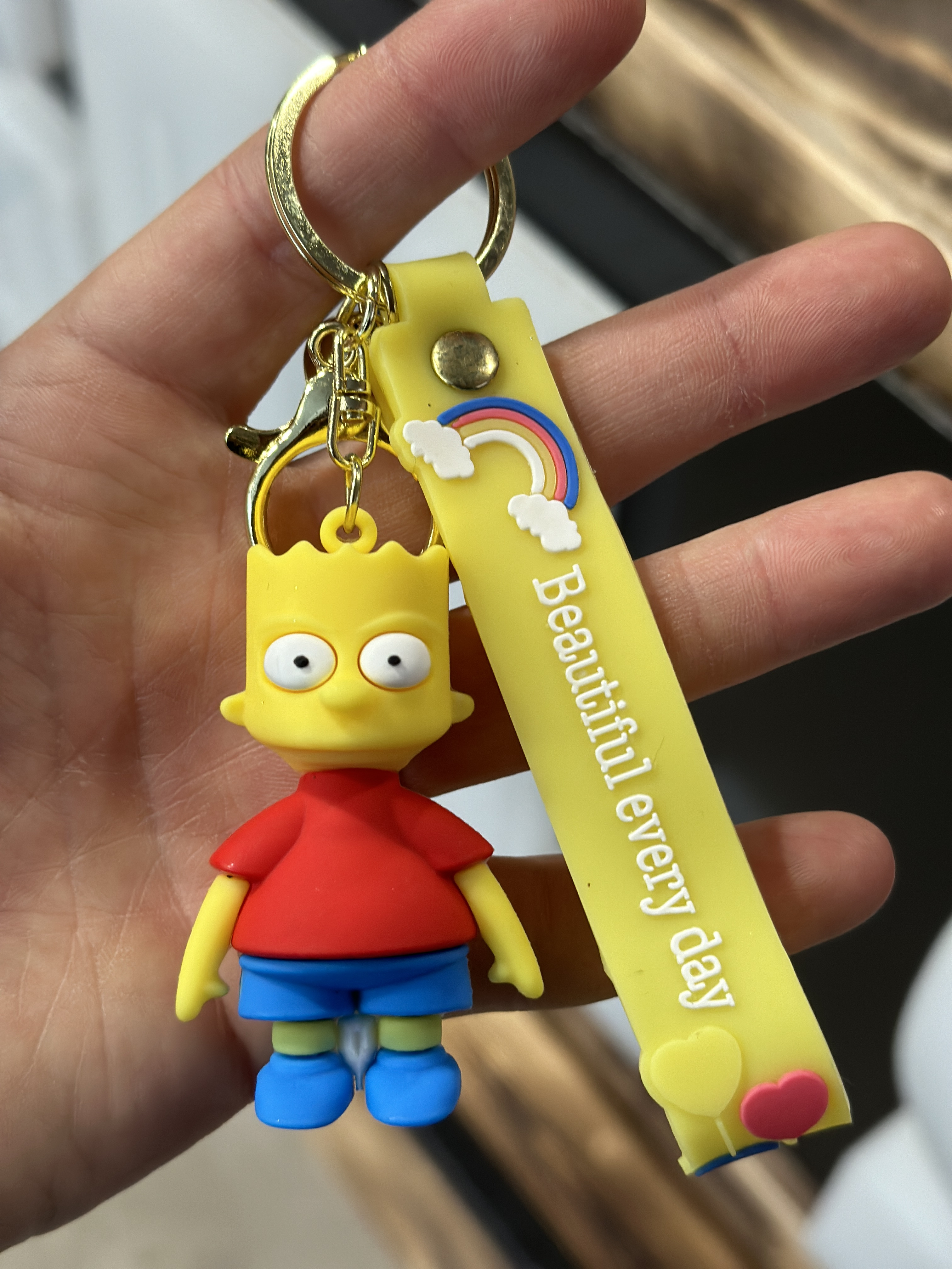 Levně Za pár stovek Stylová klíčenka Bart