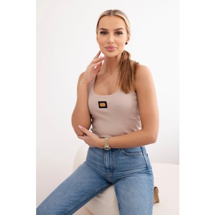 Rebrovaná blúzka s plakietkou béžová