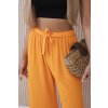 Nohavice so širokým strihom a viazaním v páse oranžové