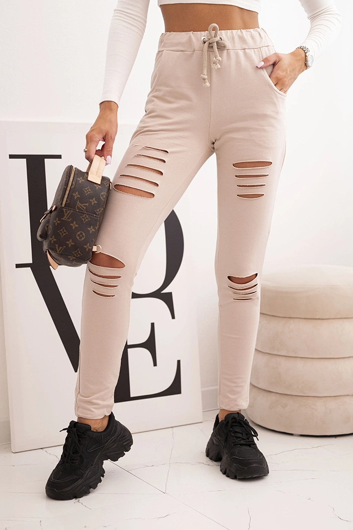 Kesi Dámské kalhoty z bavlny s roztržením a gumou v pase Barva: Béžová, Velikost: UNI