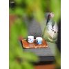 Handle with Care cups on terrace