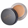 Full Coverage Concealer Sand front lid off by Inika Organic