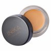 Full Coverage Concealer Tawny front lid off by Inika Organic