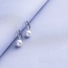 Strieborné náušnice s bielou perlou Swarovski® Crystals
