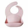 Mushie silikonovy podbradnik Blush