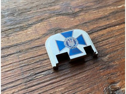 Zadní čelo závěru motiv UA, anodizace Ti