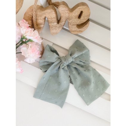 Pistáciová gumička s mašlí