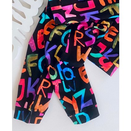 Tepláky  černá s písmenem