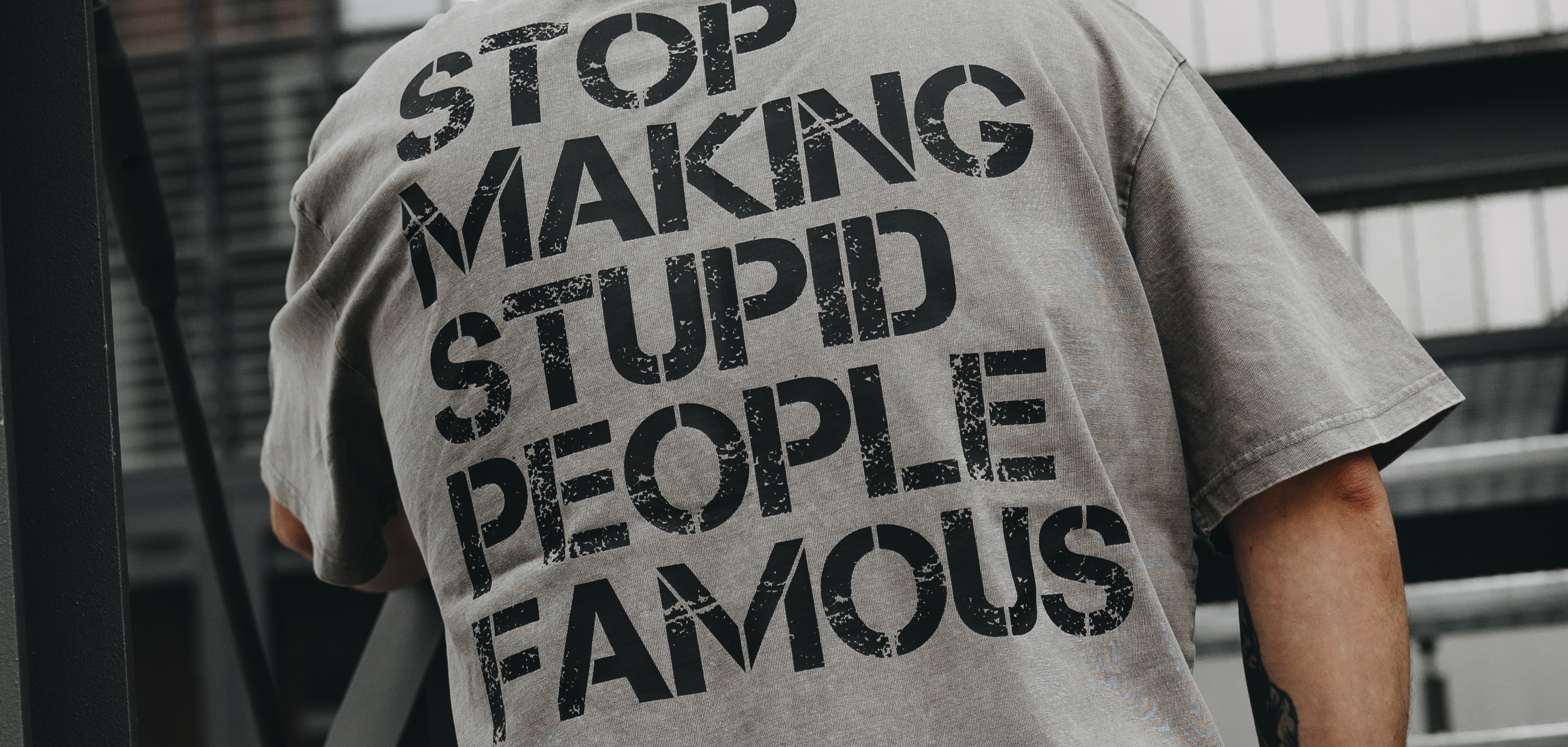 STOP MAKING STUPID PEOPLE FAMOUS - UNISEX Heavy Oversize