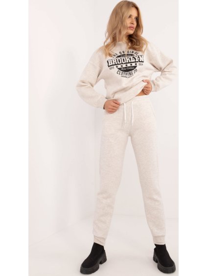 Béžové dámské tepláky s kapsami