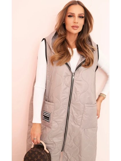 Světle béžová dámská oversize prošívaná vesta s kapucí na zip
