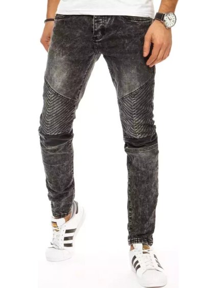 Černé džíny s prošíváním na kolenou