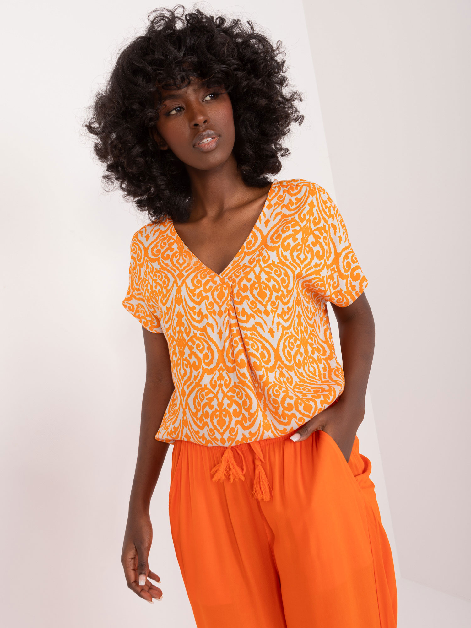 Oranžové vzorované tričko D73771M11171A-orange Velikost: XL