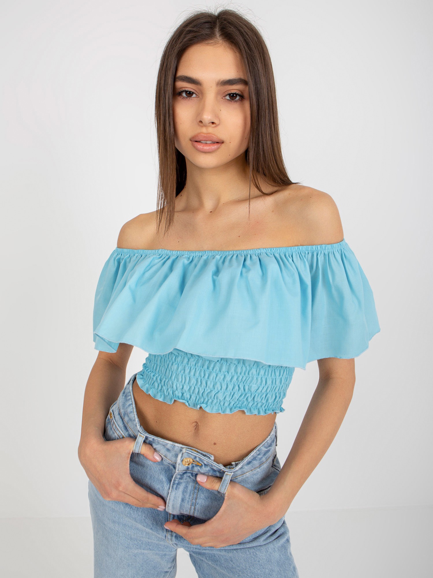 SVĚTLE MODRÝ CROP TOP S VOLÁNEM LK-TP-508609.37-LIGHT BLUE Velikost: 36