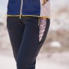 Černé dámské teplé kalhoty s hadím vzorem na bocích