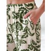 Zeleno-smetanové dámské letní široké kalhoty LOVEGARDEN s květinovým vzorem