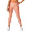 Oranžové dámské legíny Asics W Cropped Logo Seamless Tight (Velikost L)