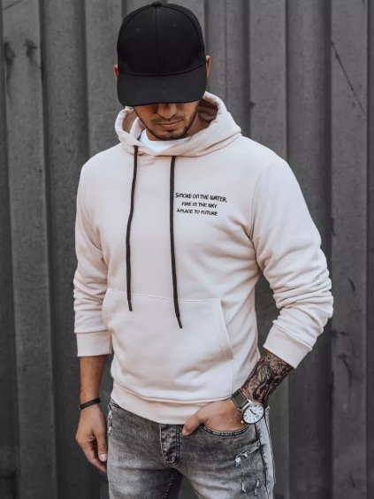 Krémszínű pulóver felirattal a mellkason